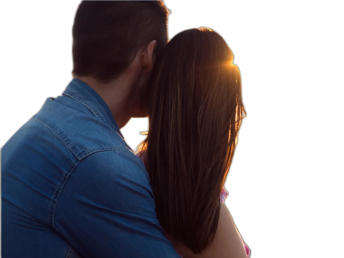 Couple embracing, he kisses his partner's forehead — confidential sexual health care
